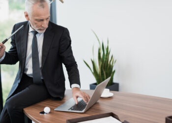 businessman playing golf