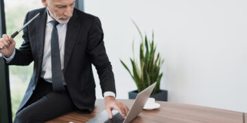 businessman playing golf