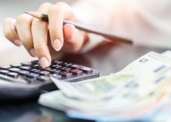 Woman counting money Euro banknotes, Business or stock market concept image.